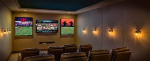 Custom Audio Video designed home theater with 5 televisions